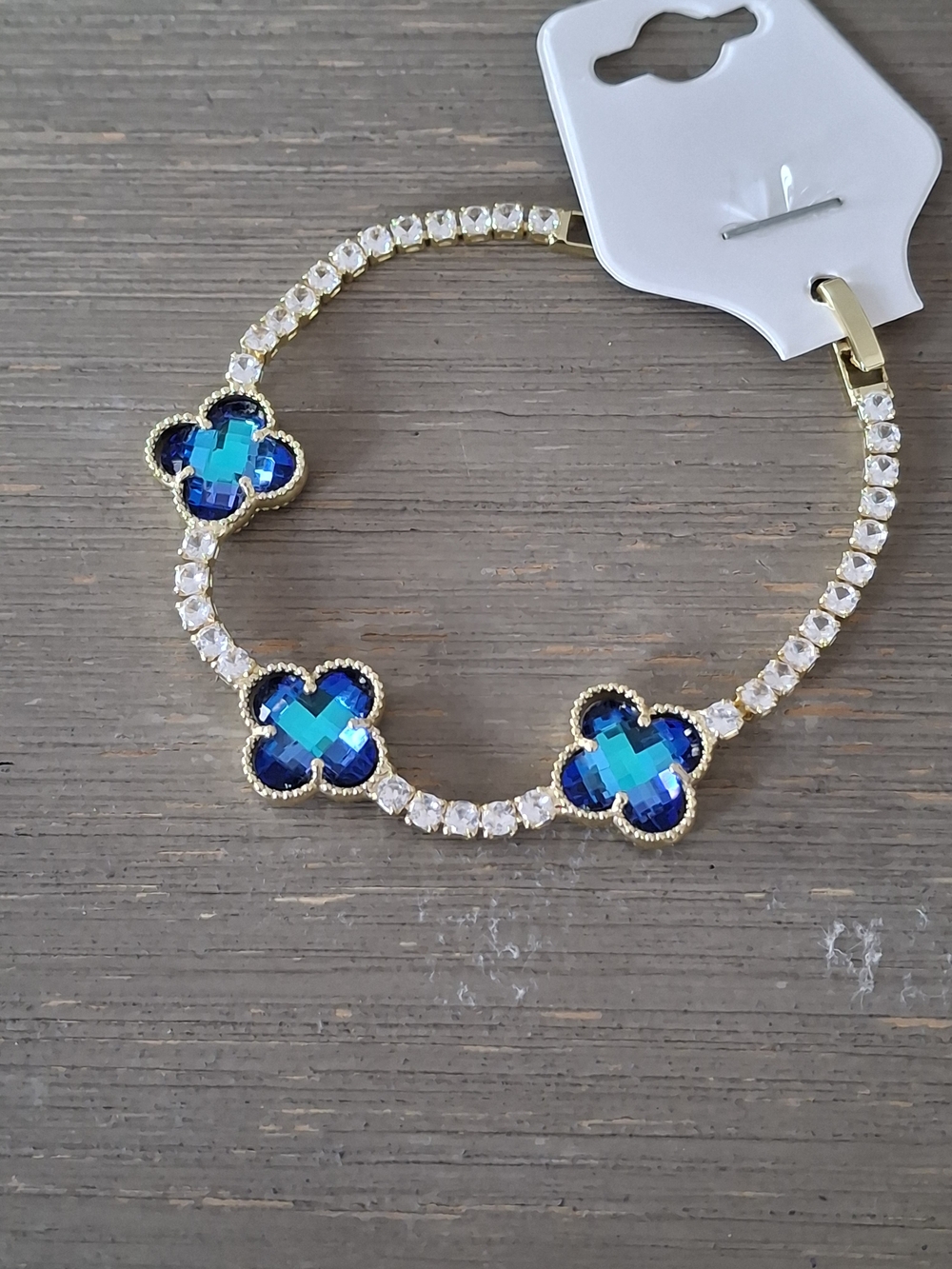 Gold Bracelet with Blue Crystal Clover Accents